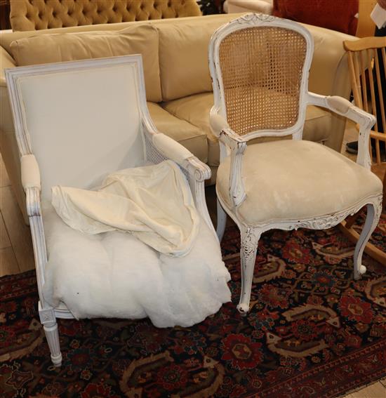 A Louis XV style white painted cane backed fauteuil and one other fauteuil with caned sides (2)